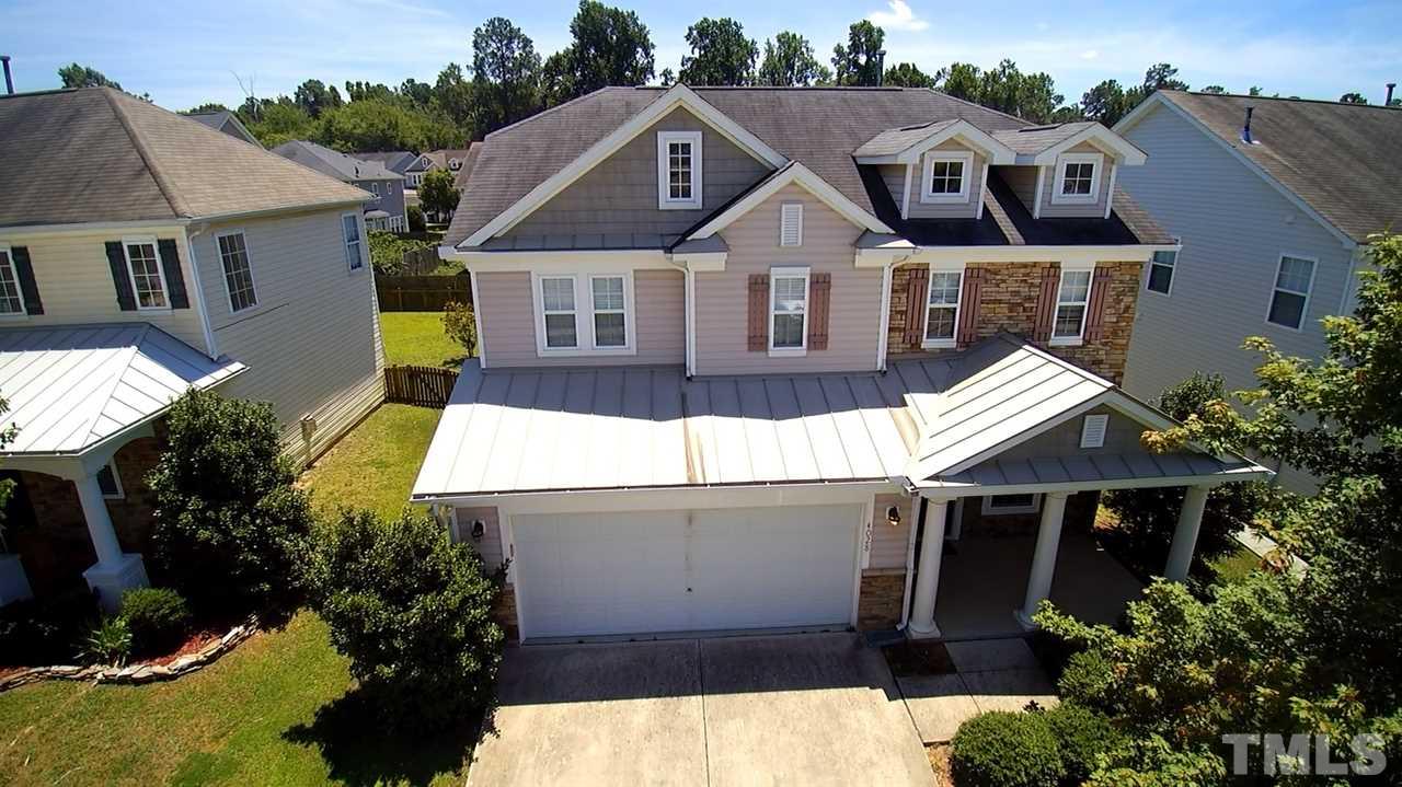 4028 Oatgrass Lane Raleigh, NC 27604 - Photo 1 of 8 a view of house with garden