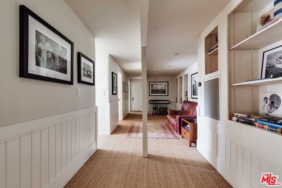3629 Serra Road Malibu, CA 90265 - Photo 11 of 26 a view of a hallway with workspace and entryway