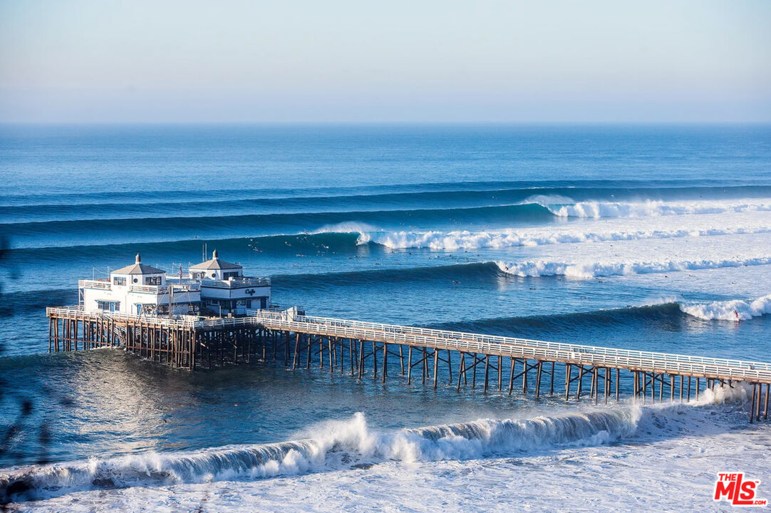 3629 Serra Road Malibu, CA 90265 - Photo 22 of 26 a view of a swimming pool and an outdoor