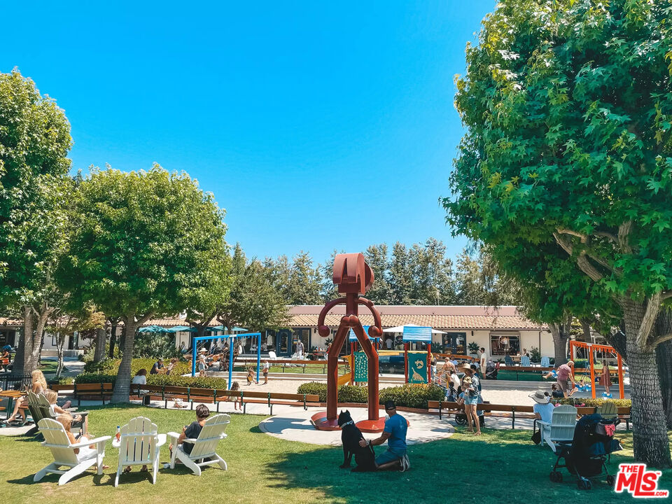 3629 Serra Road Malibu, CA 90265 - Photo 24 of 26 a view of a park with swings and slides