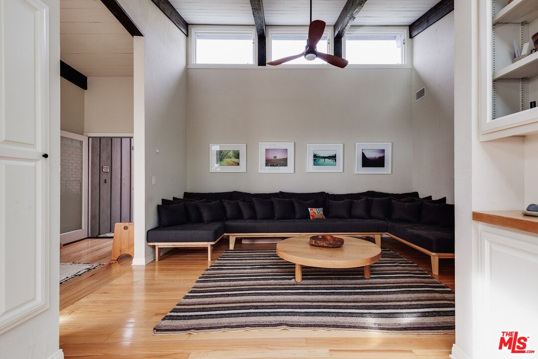 3629 Serra Road Malibu, CA 90265 - Photo 7 of 26 a view of sitting area with furniture and wooden floor