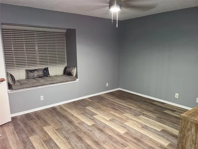 a view of a room with a window