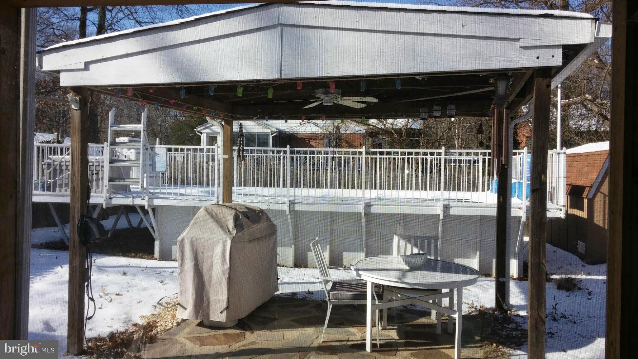 196 Pike Road Pasadena, MD 21122 - Photo 26 of 30 Backyard with covered patio