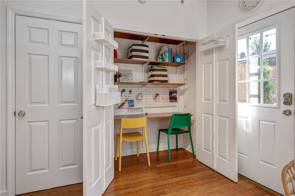 3622 Smallman Street Pittsburgh, PA 15201 - Photo 12 of 25 Off of the kitchen nook, the sellers converted a storage closet into a work station. This is a great place to hae a computer or could easily be converted to a built-in pantry closet. The closet to the left is a coat closet. This home has so much thoughtful storage throughout.