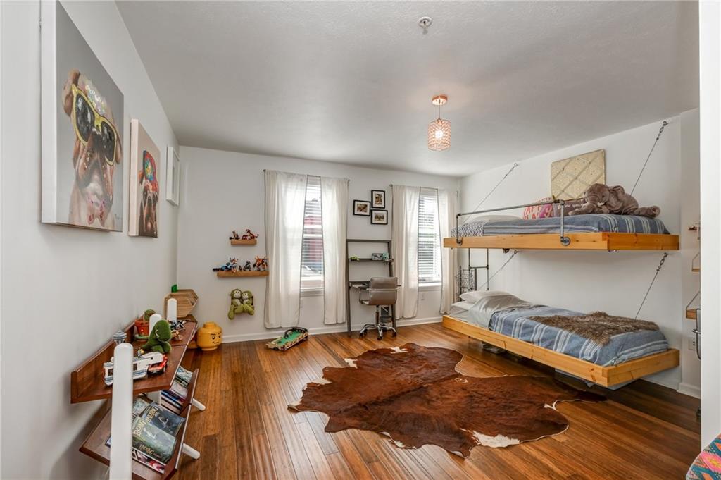 3622 Smallman Street Pittsburgh, PA 15201 - Photo 15 of 25 The homes bedrooms are spacious! This room features bamboo floors and custom built-in bunk beds. Every bedroom has great closet space and plenty of room for furniture.