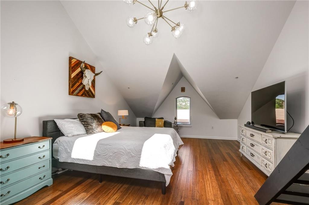 3622 Smallman Street Pittsburgh, PA 15201 - Photo 19 of 25 WOW!!! This home's master suite is truly special. there is a dramatic vaulted ceiling and two HUGE walk-in closets. The soft gold light fixture is a focal point in the room.