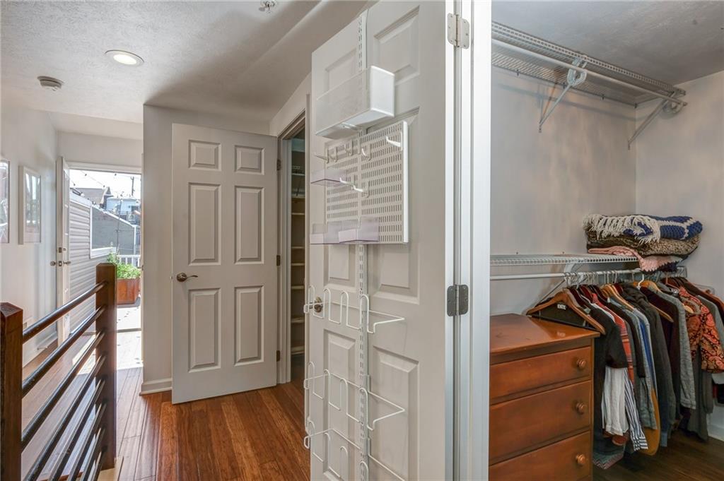 3622 Smallman Street Pittsburgh, PA 15201 - Photo 20 of 25 The master suite encompasses the upper floor of the home and features two very large walk-in closets, a sitting room, master bedroom and master bath! There also is access to the upper deck for relaxation or entertaining guests. The deck is off of the stairwell so no need to cut through a bedroom to reach the deck.