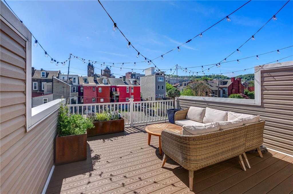 3622 Smallman Street Pittsburgh, PA 15201 - Photo 23 of 25 Not only is there a nice sized paver patio style yard, there is an upper deck with composite flooring. This deck has fun cafe lights there is a pre-plumbed gas line.