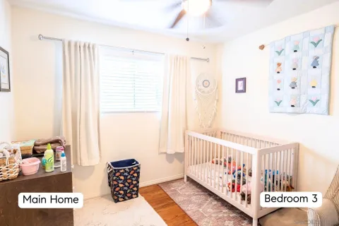 a view of a living room filled with furniture
