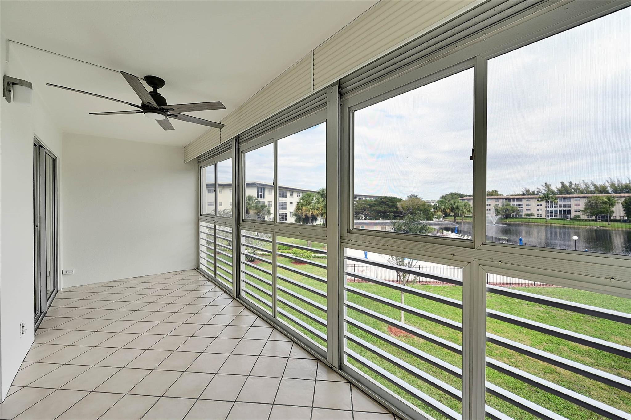 1804 Eleuthera Point, Unit E3 Coconut Creek, FL 33066 - Photo 28 of 41 a view of a street from a balcony