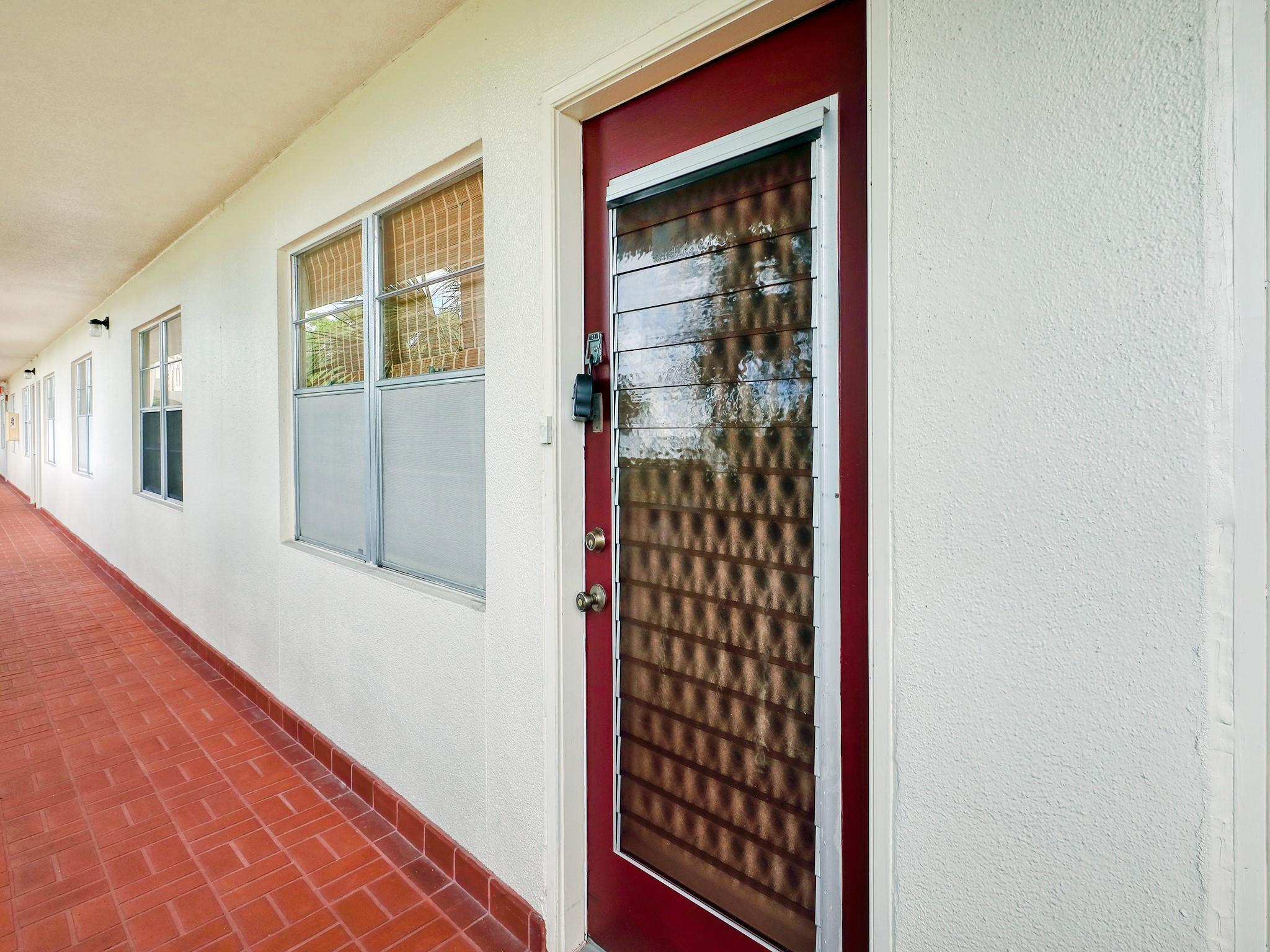 1804 Eleuthera Point, Unit E3 Coconut Creek, FL 33066 - Photo 32 of 41 a view of front door