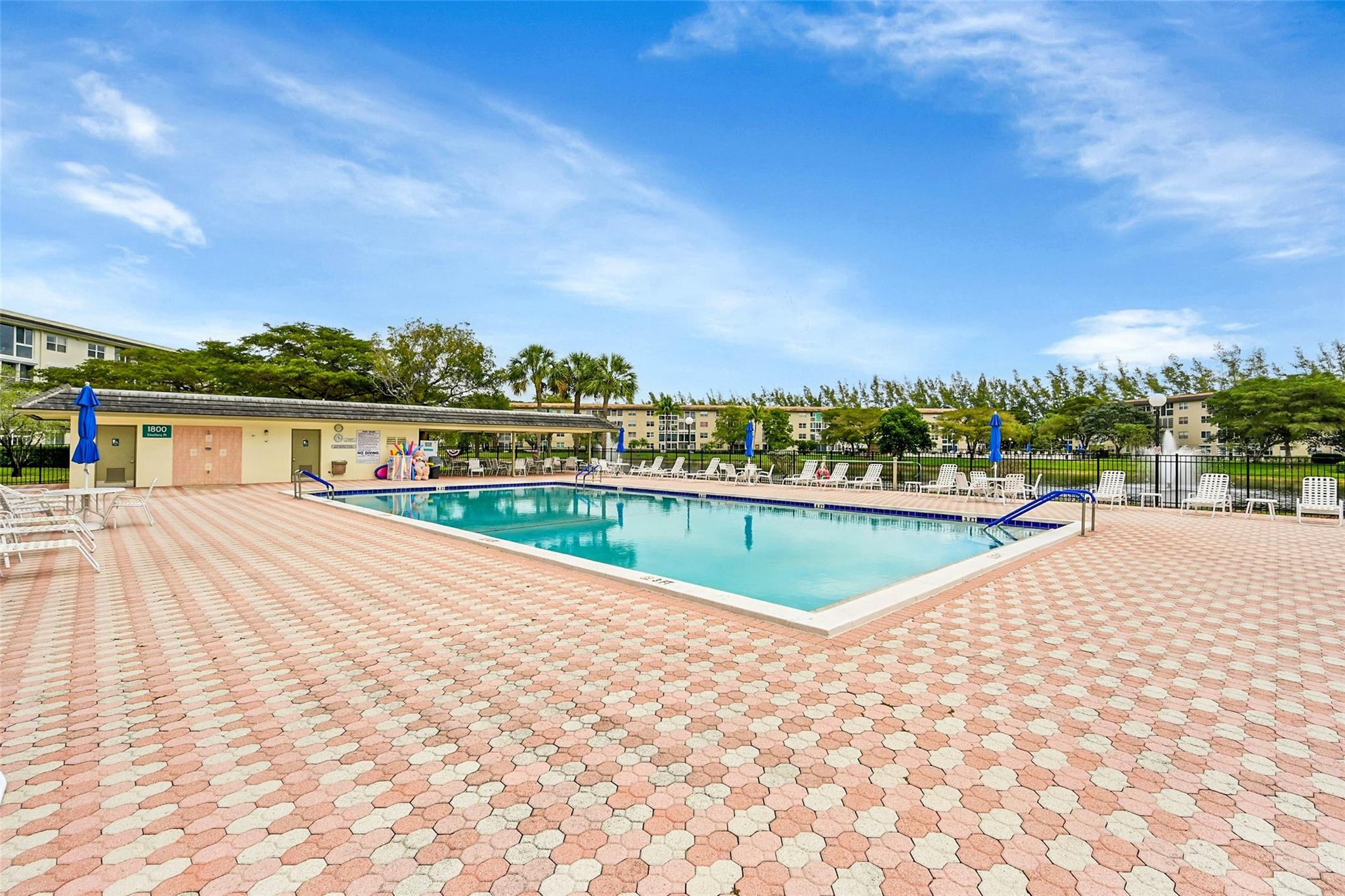 1804 Eleuthera Point, Unit E3 Coconut Creek, FL 33066 - Photo 39 of 41 a view of swimming pool with a yard