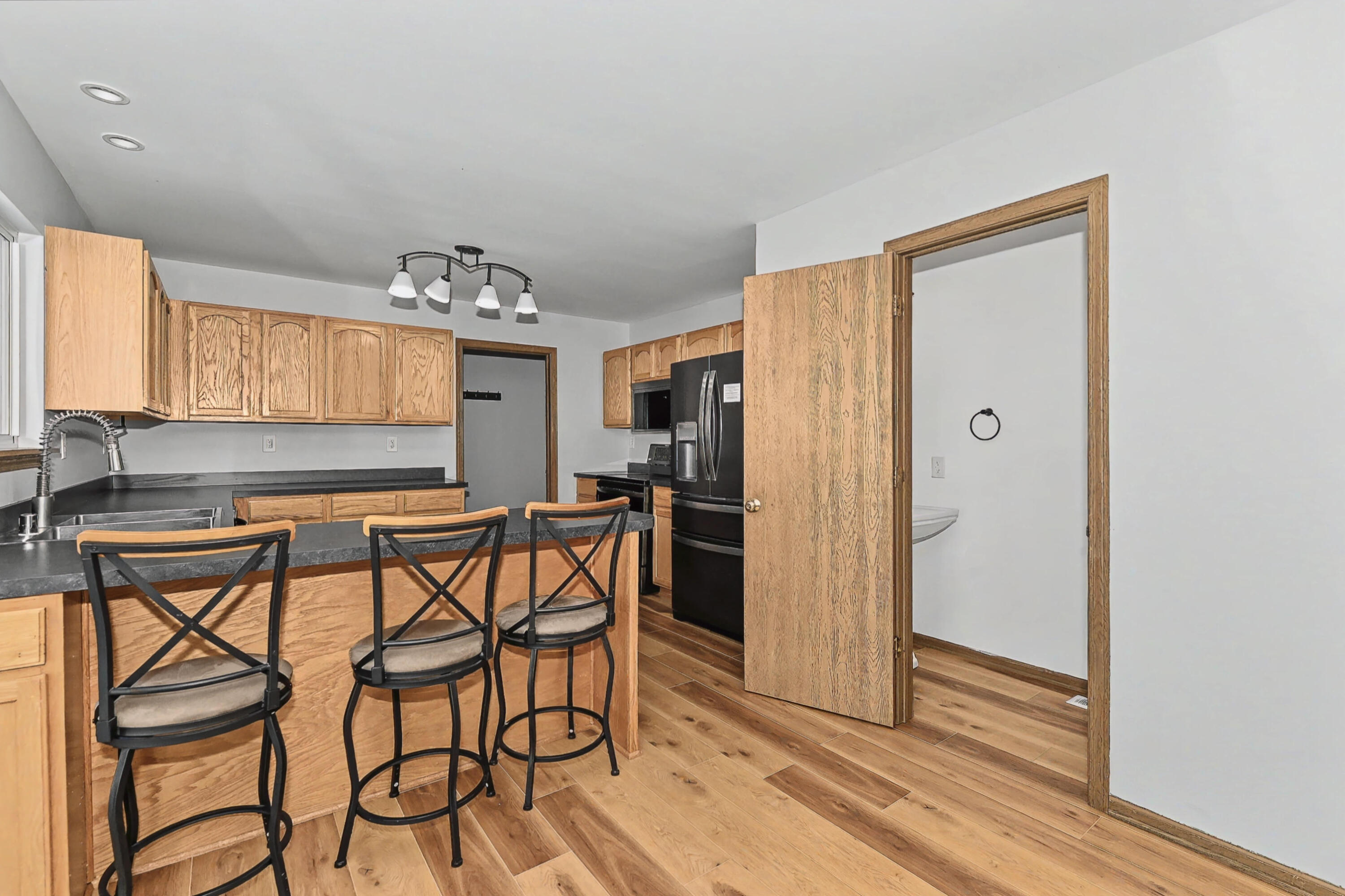 324 West Hidden Trail Elkhorn, WI 53121 - Photo 11 of 34 Snack Bar and Half Bathroom