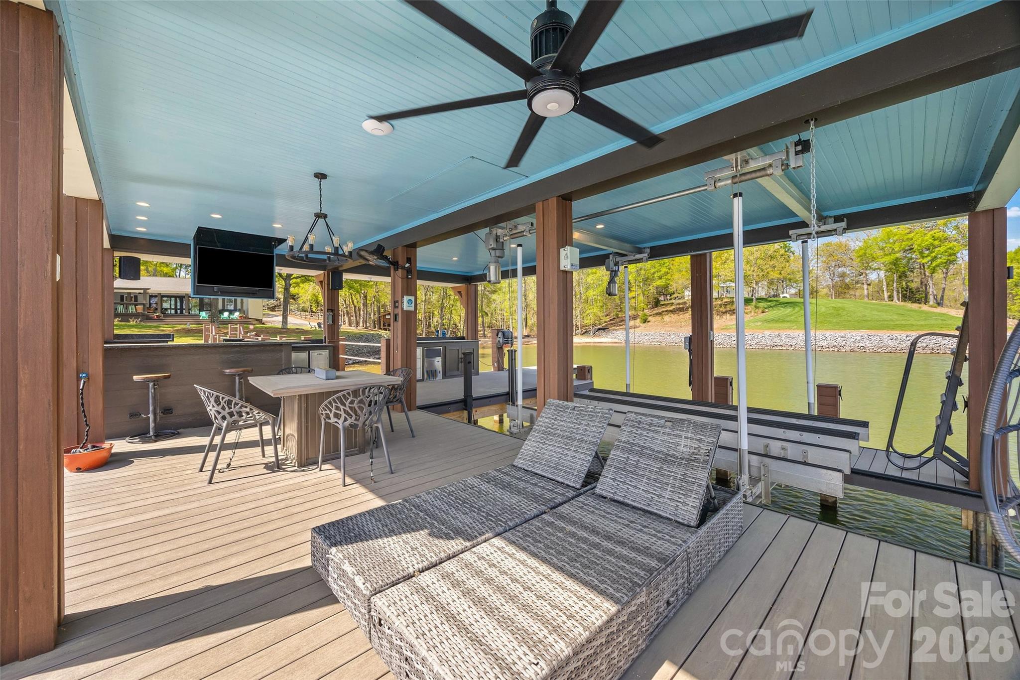 5280 Masons Ferry Road Clover, SC 29710 - Photo 33 of 45 a living room with large windows and wooden floor