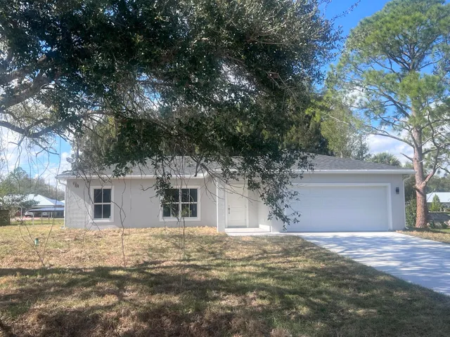a front view of house with yard