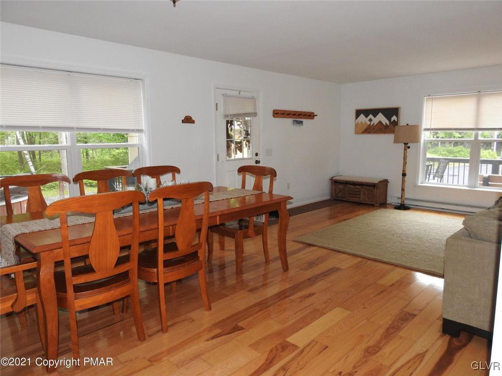 1170 Boulder Road Blakeslee, PA 18610 - Photo 18 of 46 a dining room with furniture and wooden floor