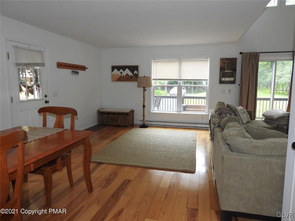 1170 Boulder Road Blakeslee, PA 18610 - Photo 19 of 46 a living room with furniture and a large window
