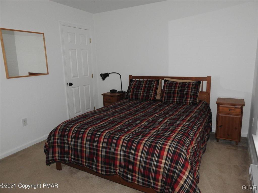 1170 Boulder Road Blakeslee, PA 18610 - Photo 34 of 46 a bedroom with a bed and dresser