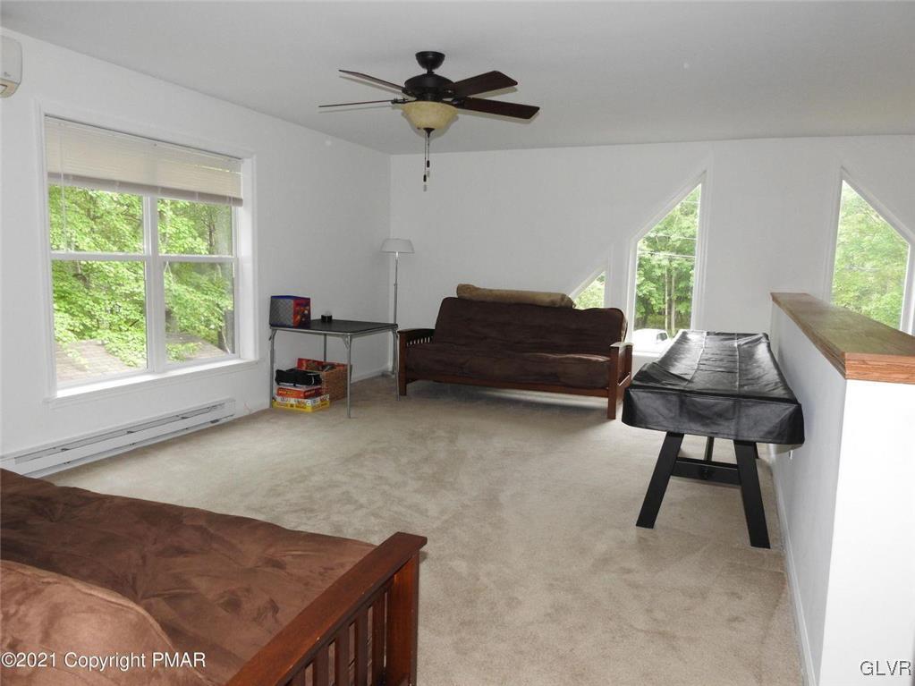 1170 Boulder Road Blakeslee, PA 18610 - Photo 36 of 46 a living room with furniture and a window