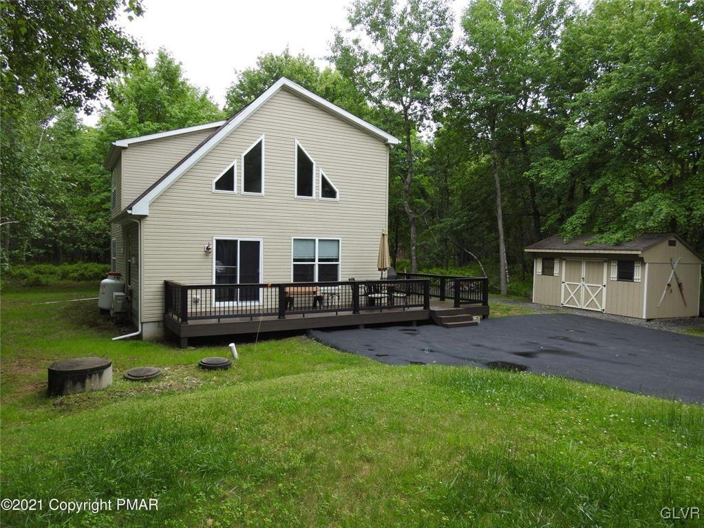 1170 Boulder Road Blakeslee, PA 18610 - Photo 41 of 46 a view of a house with a yard and sitting area