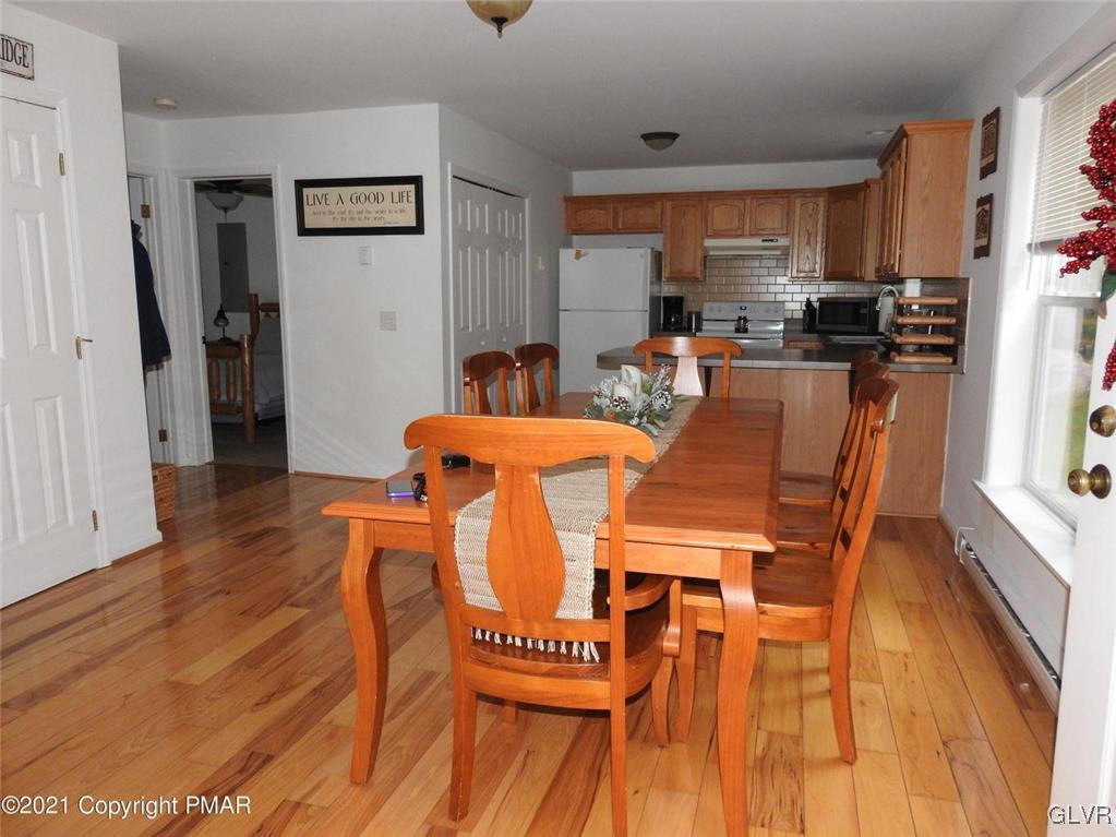1170 Boulder Road Blakeslee, PA 18610 - Photo 10 of 46 a dining room with furniture and wooden floor