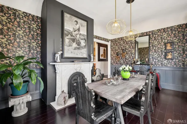a view of fireplace with washer and dryer