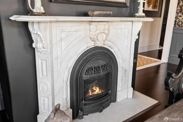 a kitchen that has a lot of cabinets in it and appliances