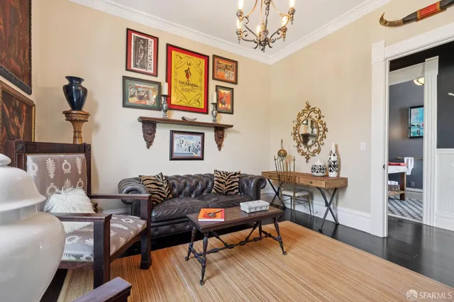 a spacious bedroom with a bed and a table in it