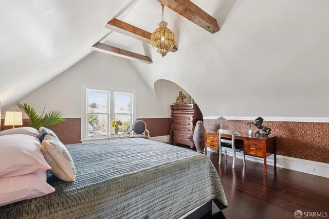 a en suite bathroom with a double vanity sink a mirror and a shower