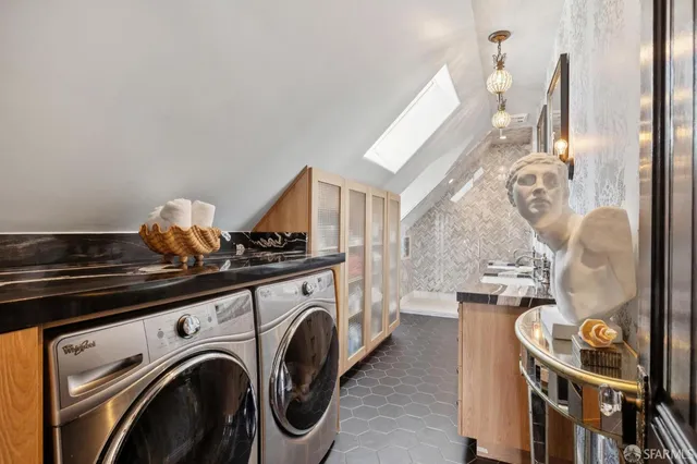 a balcony with furniture and a potted plant