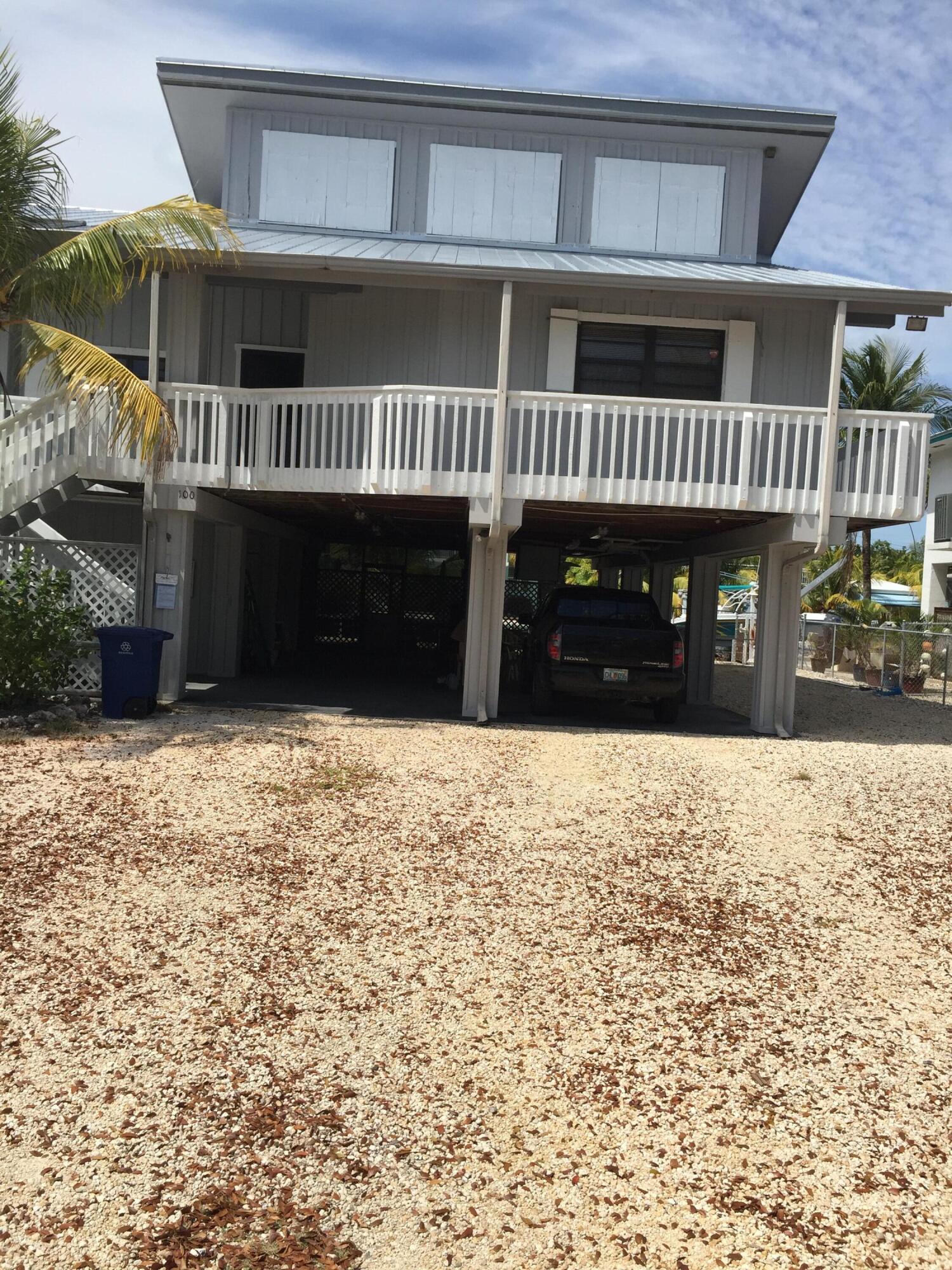 100 3rd Lane Key Largo, FL 33037 - Photo 2 of 14 1003r_front2