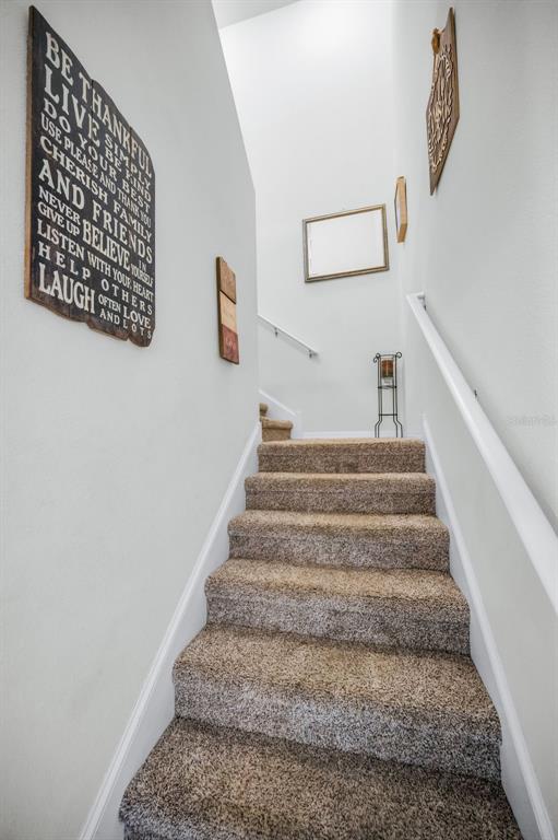 5529 White Marlin Court New Port Richey, FL 34652 - Photo 34 of 63 a view of staircase with white walls