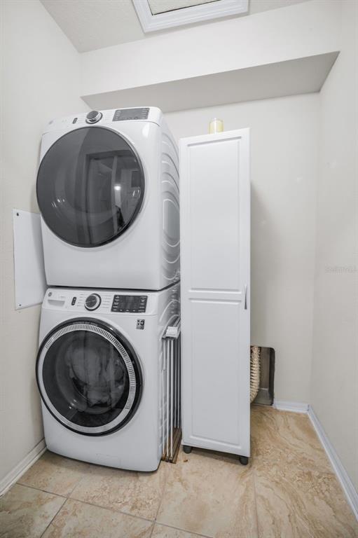 5529 White Marlin Court New Port Richey, FL 34652 - Photo 40 of 63 a utility room with dryer and washer