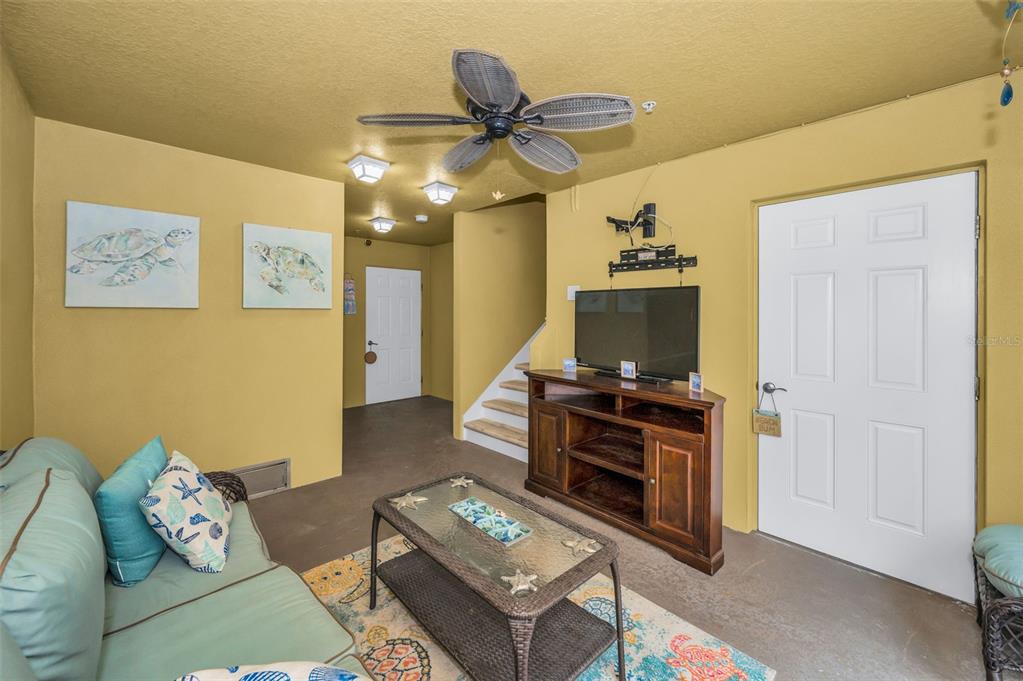 5529 White Marlin Court New Port Richey, FL 34652 - Photo 8 of 63 a living room with furniture and a window