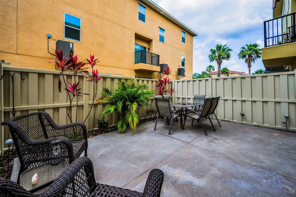 5529 White Marlin Court New Port Richey, FL 34652 - Photo 10 of 63 a view of a chairs and table in the patio