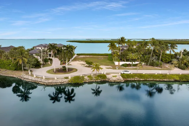 a view of a lake with a yard