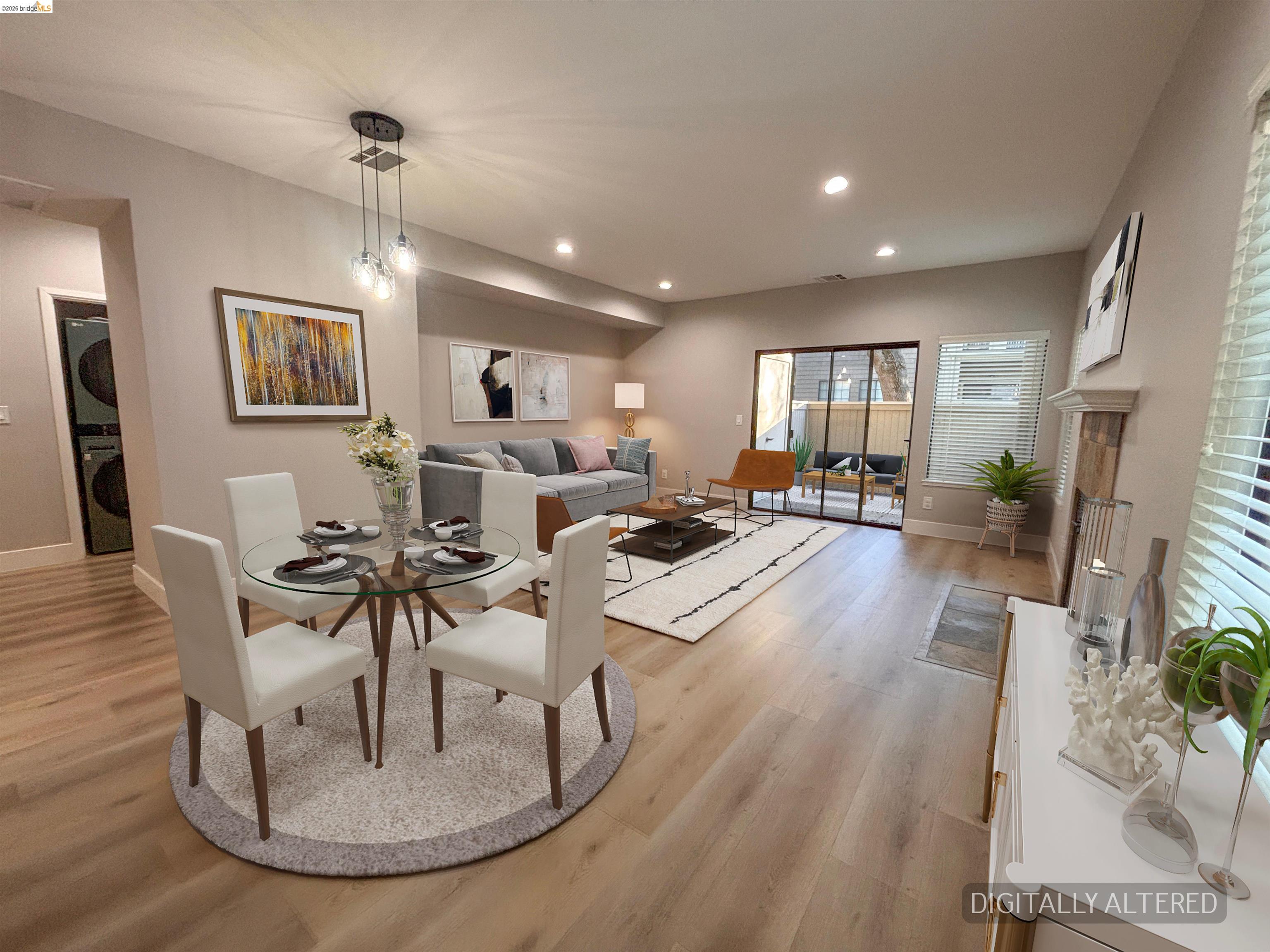 450 Pine Ridge Drive San Ramon, CA 94582 - Photo 6 of 18 a living room with furniture couches and a dining table with wooden floor