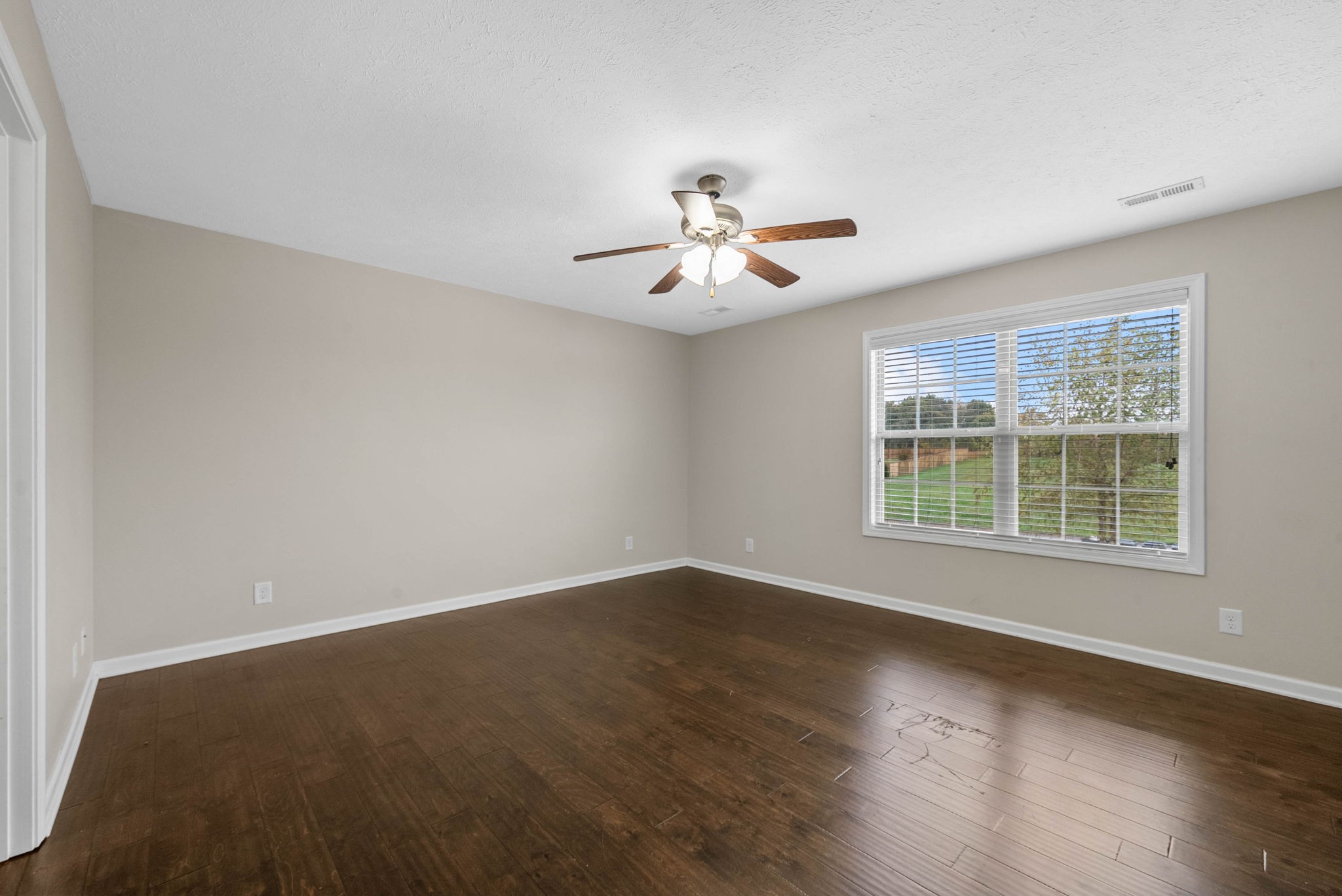 133 Melbourne Drive, Unit E Clarksville, TN 37043 - Photo 10 of 16 a view of an empty room with a window