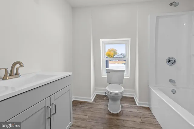 a bathroom with a sink and a bathtub