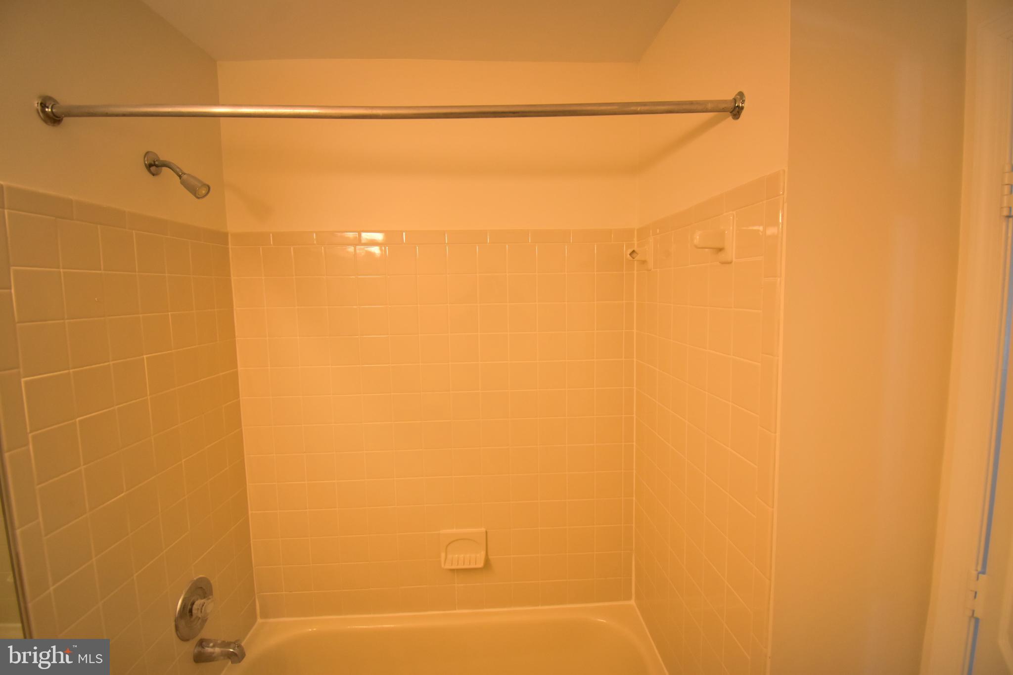 7707 Klovstad Drive Fort Washington, MD 20744 - Photo 8 of 15 a bathroom with a shower