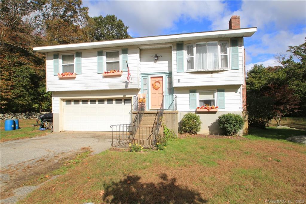 11 Doyle Road Montville, CT 06370 - Photo 1 of 1 a front view of a house with a yard