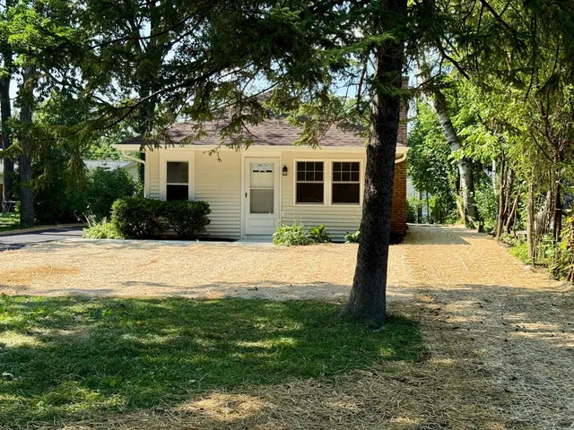 a house view with a garden space