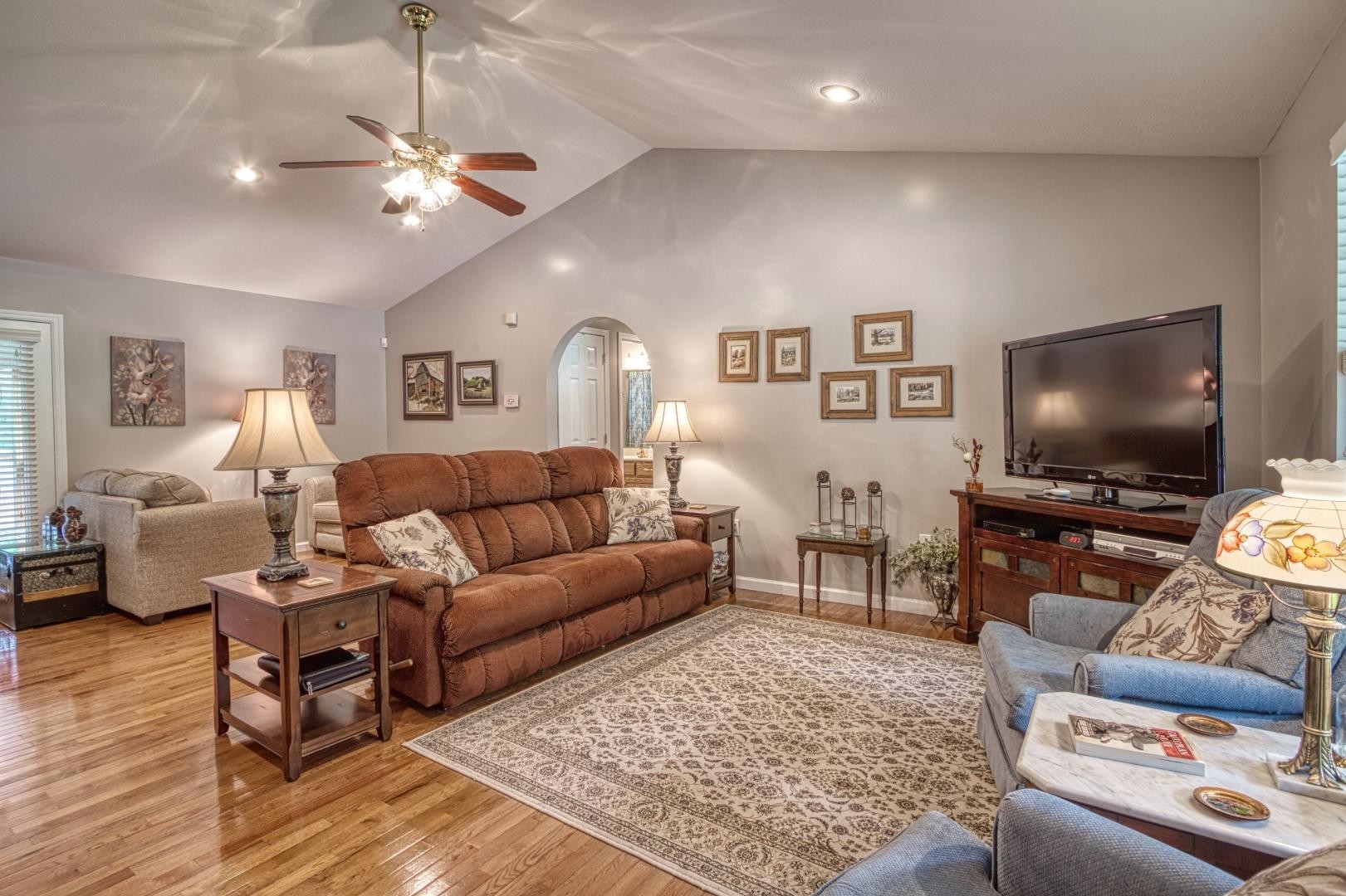 720 Rock House Road Kodak, TN 37764 - Photo 3 of 18 a living room with furniture and a flat screen tv