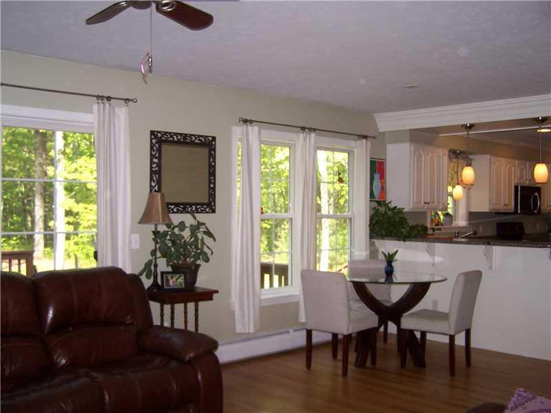 14 Sullivan Lane Saco, ME 04072 - Photo 5 of 21 Living Room. Open concept kitchen,...