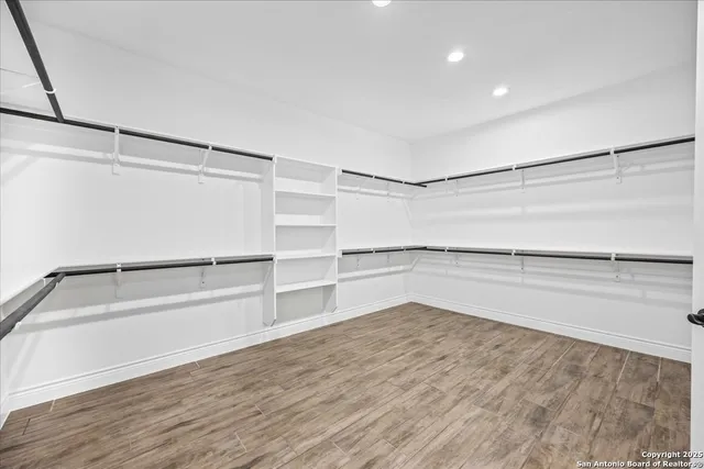 a view of an empty walk in closet