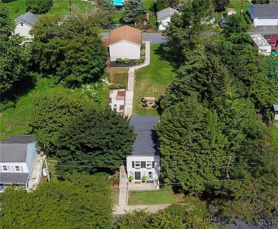 389 West Nesquehoning Street Easton, PA 18042 - Photo 12 of 44 an aerial view of a house with a yard and trees