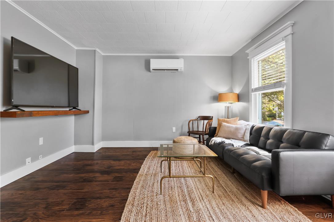 389 West Nesquehoning Street Easton, PA 18042 - Photo 15 of 44 a living room with furniture and a flat screen tv