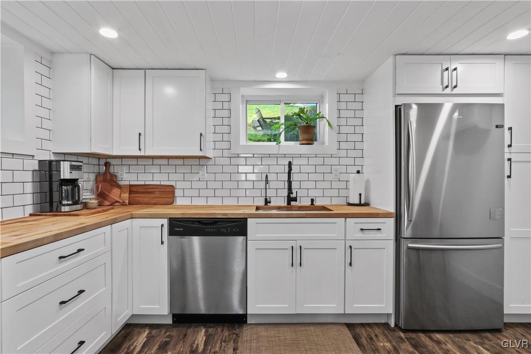 389 West Nesquehoning Street Easton, PA 18042 - Photo 21 of 44 a kitchen with stainless steel appliances a refrigerator sink and cabinets