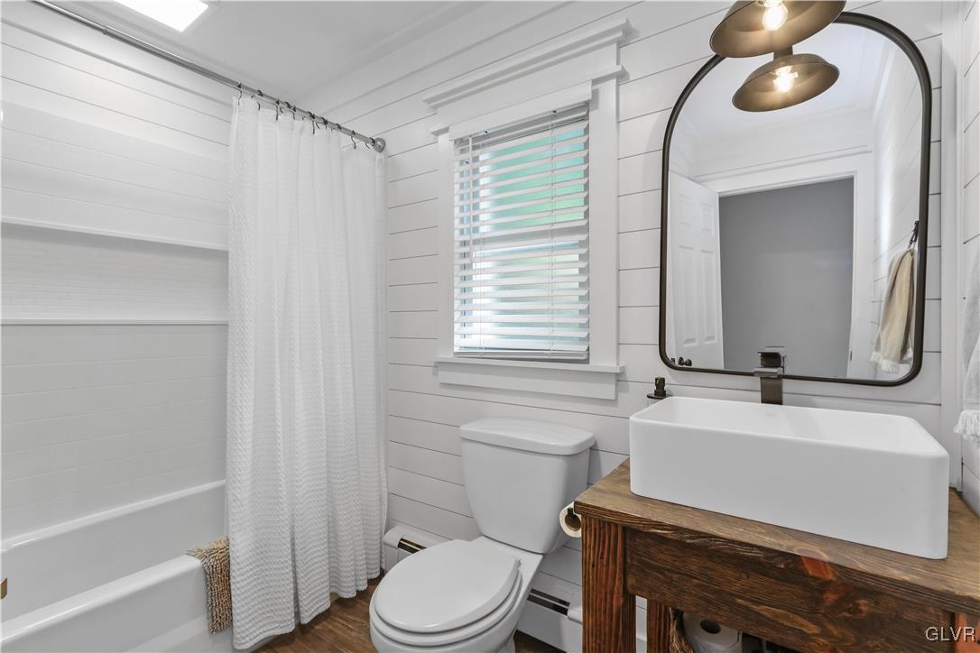 389 West Nesquehoning Street Easton, PA 18042 - Photo 23 of 44 a bathroom with a sink a toilet and shower