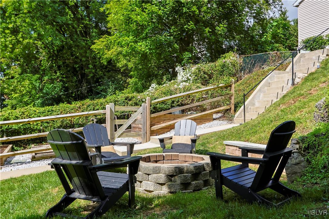 389 West Nesquehoning Street Easton, PA 18042 - Photo 3 of 44 a view of deck with chairs and wooden fence